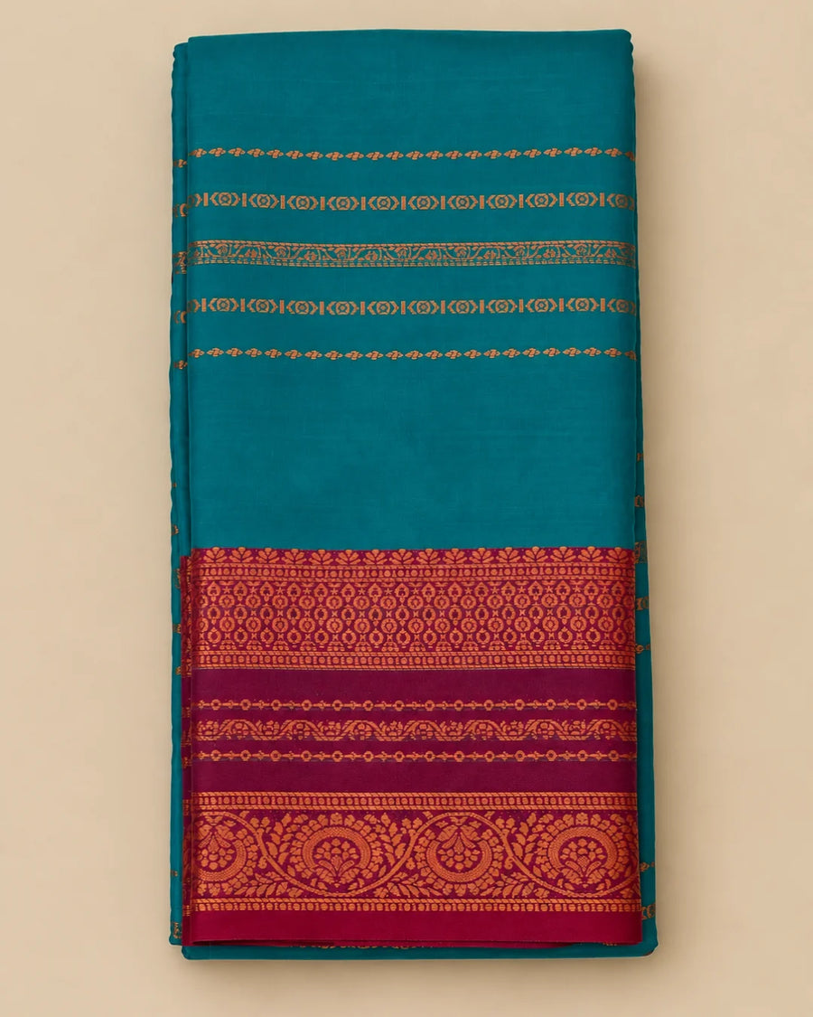 Teal green Velthari Softsilk Saree with premium gold zari border